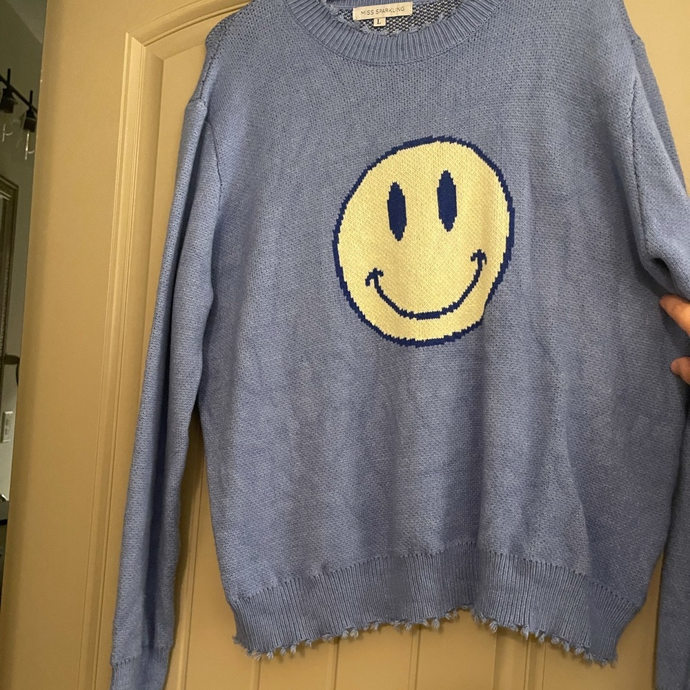 Smiley face sweater